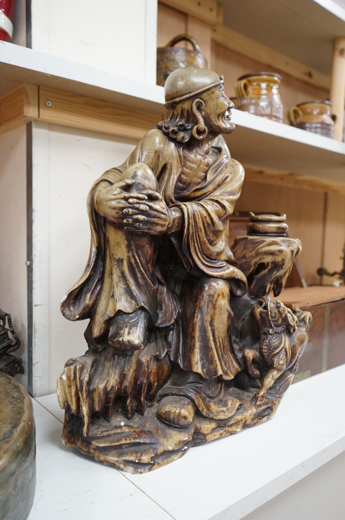 A large Chinese soapstone figure of a Luohan, 48cm